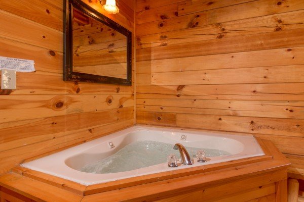 Jacuzzi at Alpine Sondance, a 2 bedroom cabin rental located in Pigeon Forge