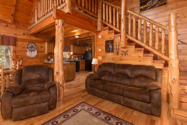 Sofa and chair in the living room at Alpine Sondance, a 2 bedroom cabin rental located in Pigeon Forge