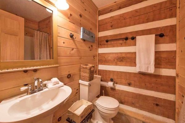 En suite bathroom at Wild at Heart, a 1 bedroom cabin rental located in Gatlinburg