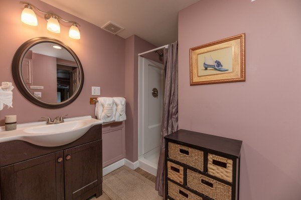 Bathroom with a shower stall, vanity, and drawer unit at Best View Ever, a 5 bedroom cabin rental located in Pigeon Forge