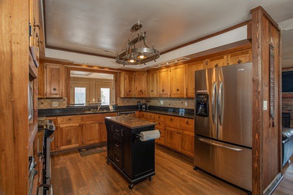 Kitchen with an island and stainless appliances at Best View Ever! A 5 bedroom cabin rental in Pigeon Forge