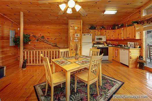 Dining and kitchen area at Paradise View, a 1 bedroom cabin rental located in Pigeon Forge