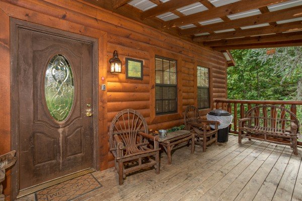 Covered front porch at Paradise View, a 1 bedroom cabin rental located in Pigeon Forge