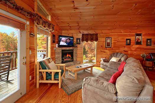 Living room with fireplace at Paradise View, a 1 bedroom cabin rental located in Pigeon Forge