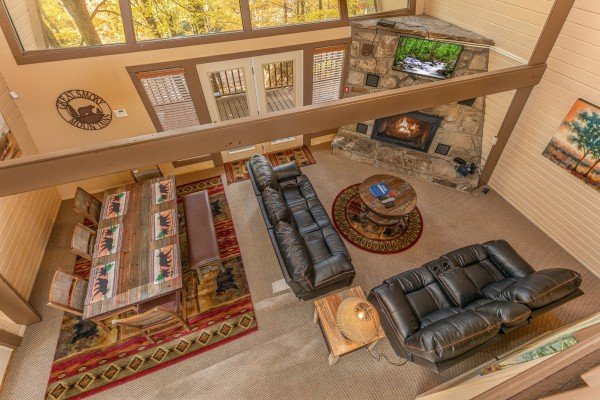 Looking down at the living and dining space at Gatlinburg Lodge, a 5 bedroom cabin rental in Gatlinburg