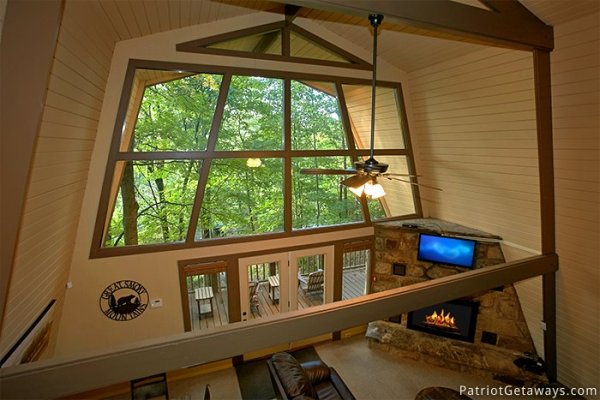 Tall ceilings with natural light in the living room at Gatlinburg Lodge, a 6-bedroom cabin rental located in Gatlinburg