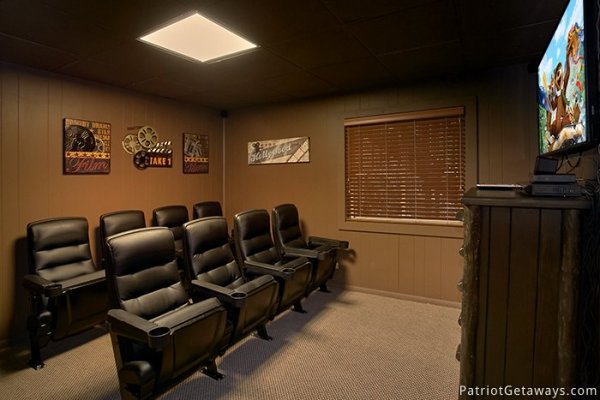 Theater seating in the movie room at at Gatlinburg Lodge, a 6-bedroom cabin rental located in Gatlinburg