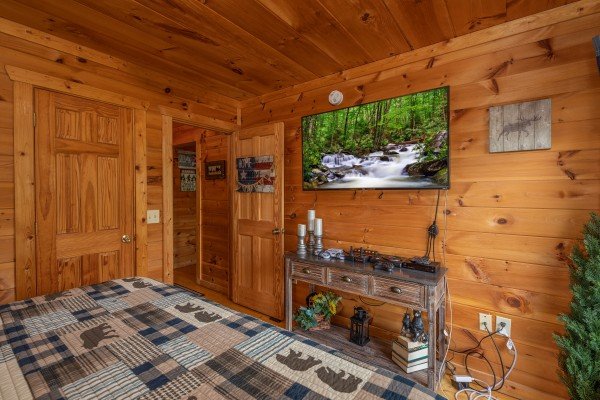 Console and TV in a bedroom at Sweet Serenity, a 2 bedroom cabin rental located in Gatlinburg