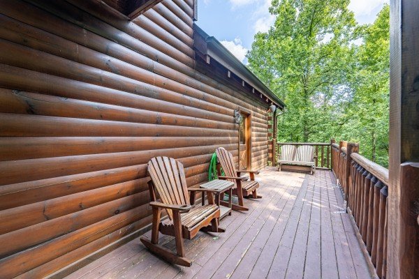 Deck area with seating at A Bear on the Ridge, a 2 bedroom cabin rental located in Pigeon Forge