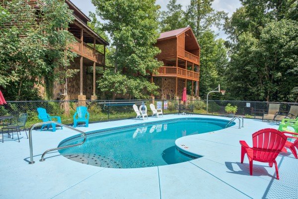 Pool and chairs for guests at Paws on the Porch, a 2 bedroom cabin rental located in Gatlinburg
