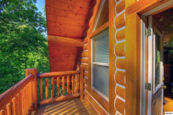 Deck off the loft space at Rising Wolf Lodge, a 3 bedroom cabin rental located in Pigeon Forge