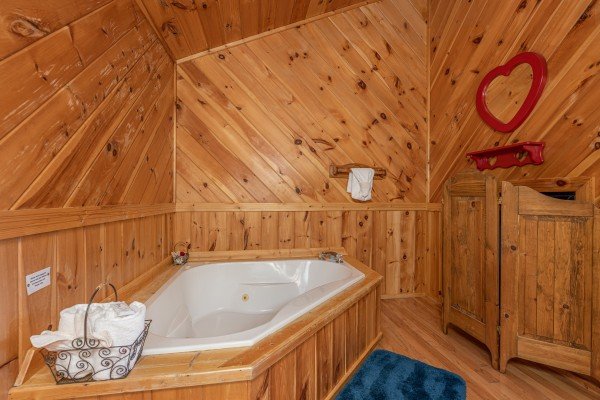 Jacuzzi tub in a bedroom at Kaleidoscope, a 2 bedroom cabin rental located in Pigeon Forge