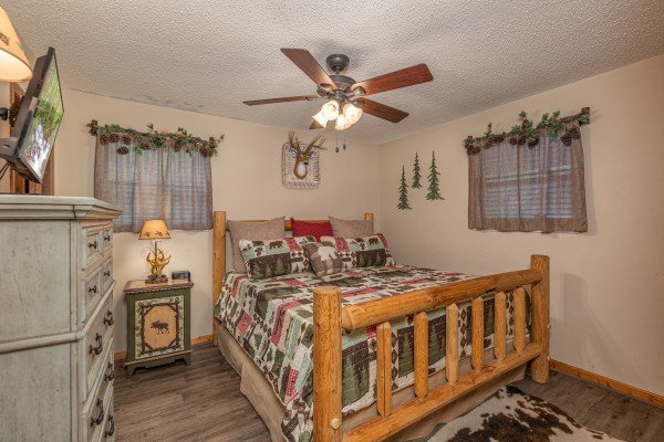 Bedroom with dresser at Magic Moments, a 2 bedroom cabin rental located in Pigeon Forge