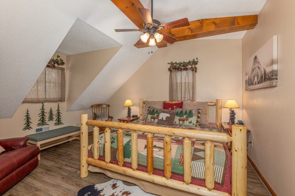 Loft log bed at Magic Moments, a 2 bedroom cabin rental located in Pigeon Forge