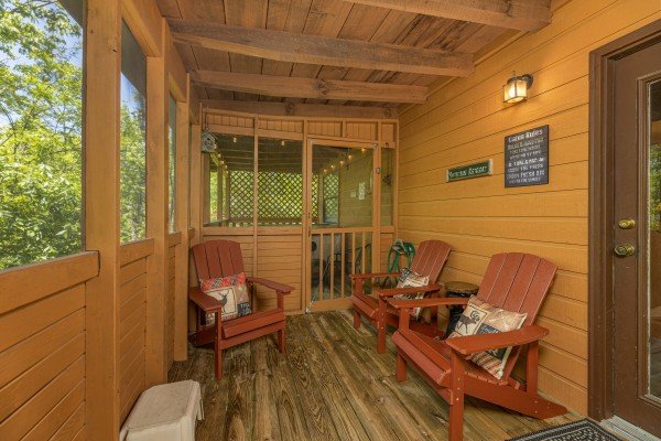 Screened in porch at Magic Moments, a 2 bedroom cabin rental located in Pigeon Forge