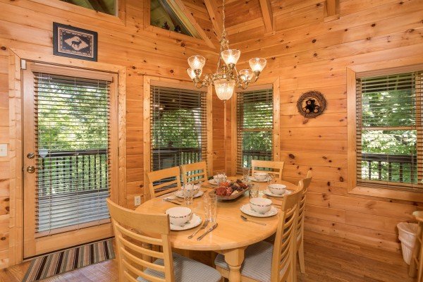 Dining table for six at Friends in High Places, a 4-bedroom cabin rental located in Pigeon Forge