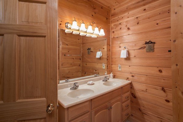Bathroom with a double vanity at Friends in High Places, a 4-bedroom cabin rental located in Pigeon Forge