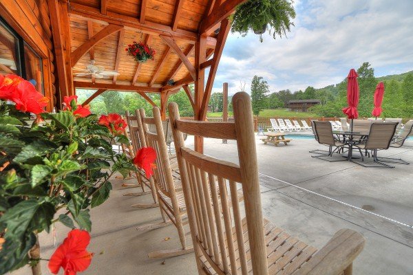 Pool area at Friends in High Places, a 4-bedroom cabin rental located in Pigeon Forge