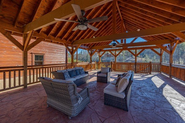 Outdoor seating at Mountain Joy, an 8 bedroom cabin rental located in Pigeon Forge