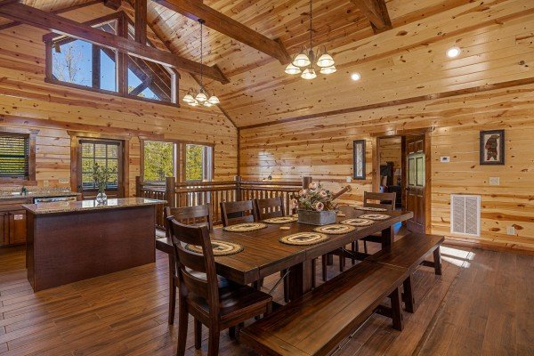 Dining table for 8 at Mountain Joy, an 8 bedroom cabin rental located in Pigeon Forge