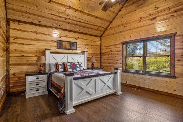 King bedroom at Mountain Joy, an 8 bedroom cabin rental located in Pigeon Forge