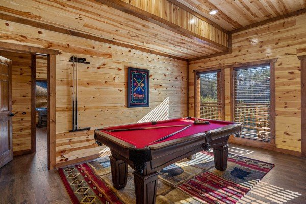 Pool table at Mountain Joy, an 8 bedroom cabin rental located in Pigeon Forge