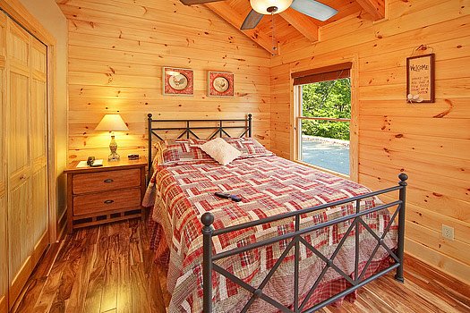 Third floor queen bedroom at Southern Sunrise, a 4 bedroom cabin rental located in Pigeon Forge