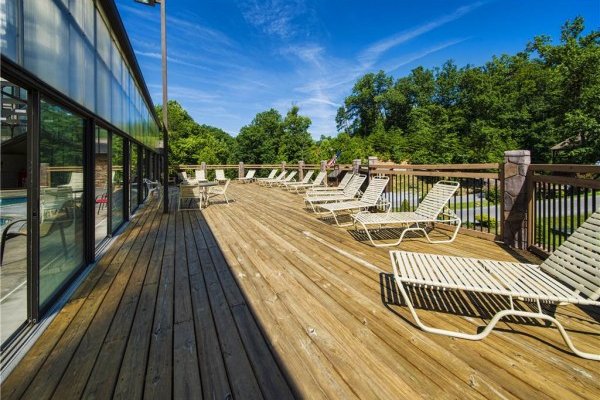 Outdoor pool deck at Hidden Springs Resort for guests of Oakwood, a 1 bedroom cabin rental located in Pigeon Forge