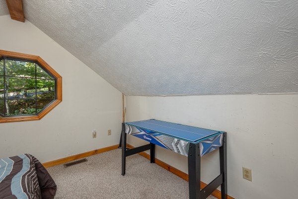 Game table at Oakwood, a 1 bedroom cabin rental located in Pigeon Forge