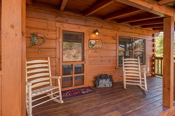 Front porch at Bear Hug Hideaway, a 1-bedroom cabin rental located in Pigeon Forge