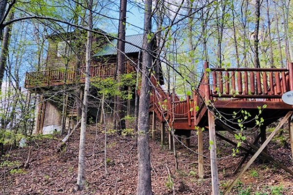 Looking back up at the deck at Swept Away in the Smokies, a 1 bedroom cabin rental located in Pigeon Forge