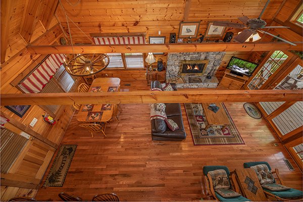 Living room and dining space at Eagles View Lodge, a 3 bedroom cabin rental located in Gatlinburg