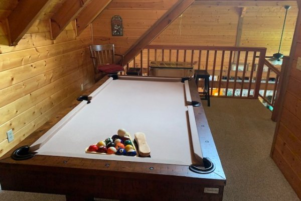 Pool table in the loft at Eagles View Lodge, a 3 bedroom cabin rental located in Gatlinburg