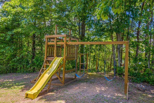 Playground set in the yard at Eagles View Lodge, a 3 bedroom cabin rental located in Gatlinburg