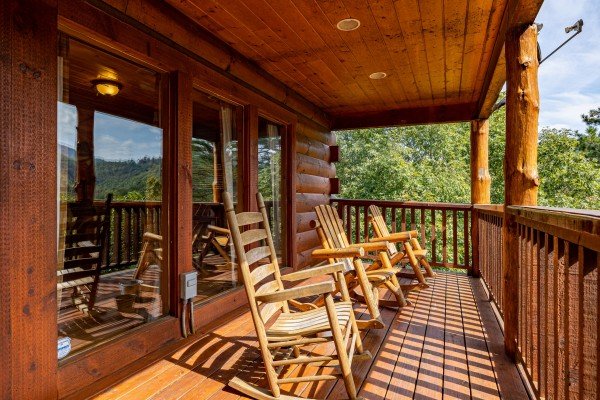 Deck rocking chairs at The Great Outdoors, a 3 bedroom cabin rental located in Pigeon Forge