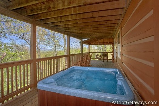 Hot tub on the deck at On Angels Wings, a 5 bedroom cabin rental located in Gatlinburg