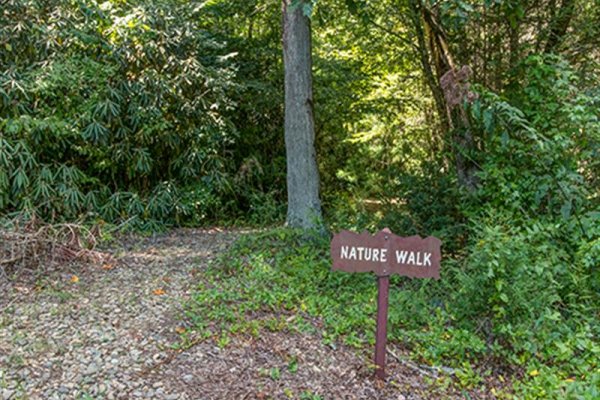 Walking trail at Cedar Falls Resort for guests at Wagon Wheel Cabin, a 3 bedroom cabin rental located in Pigeon Forge