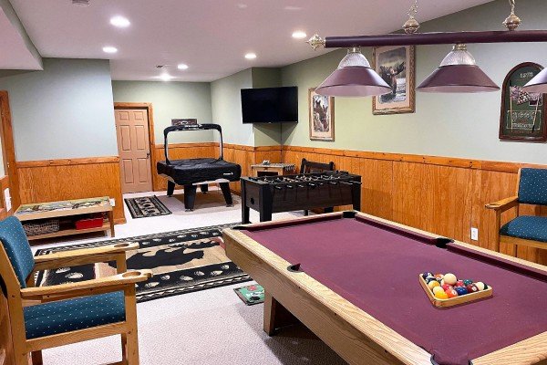 Game room at Lazy Bear Retreat, a 4 bedroom cabin rental located in Pigeon Forge