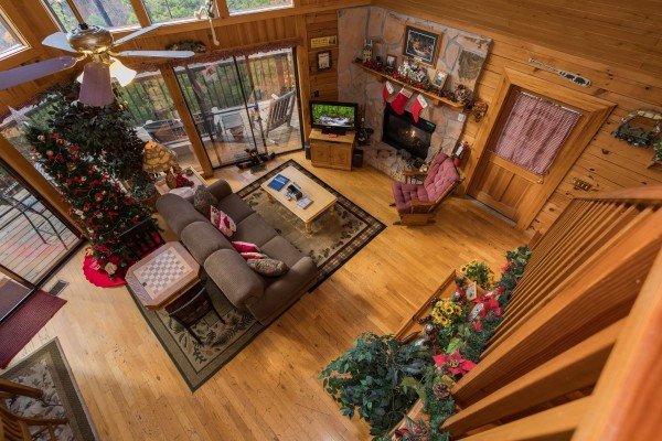 Looking down at the living room at R & R Hideaway, a 1 bedroom cabin rental located in Pigeon Forge