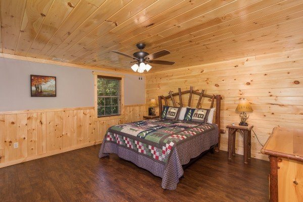 Bedroom with a king-sized bed at Grill & Chill, a 2-bedroom Gatlinburg cabin rental