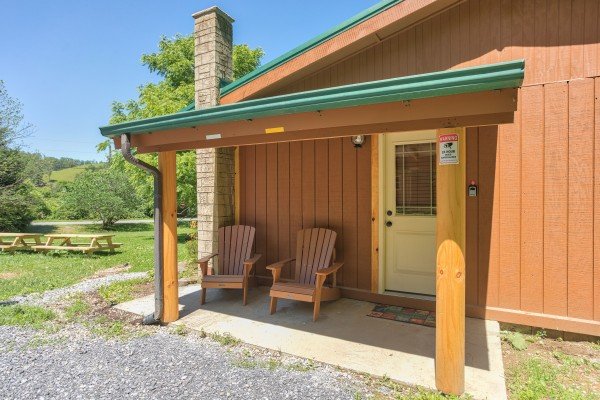Front porch with Adirondack chairs at Grill & Chill, a 2-bedroom Gatlinburg cabin rental