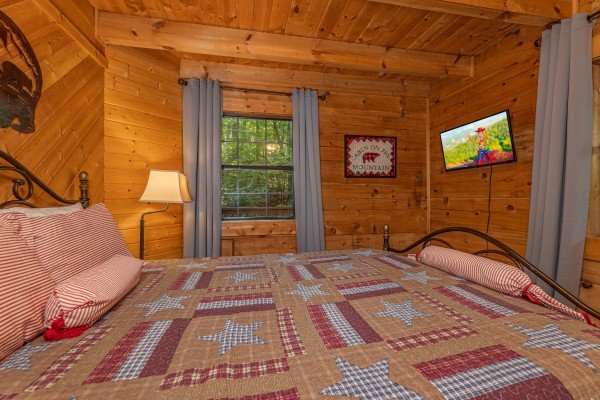 Bedroom TV at Cabin on the Mountain, a 2 bedroom cabin rental located in Gatlinburg