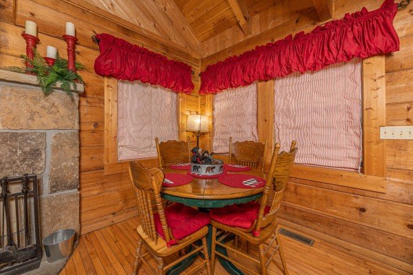 Dining for four at Cabin on the Mountain, a 2 bedroom cabin rental located in Gatlinburg 