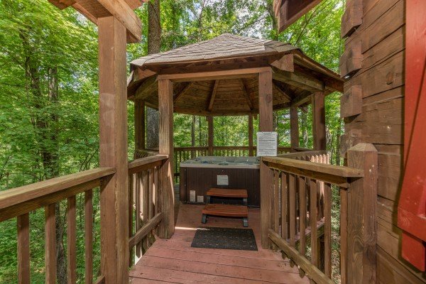 Hot tub in a gazebo on the deck at Cabin on the Mountain, a 2 bedroom cabin rental located in Gatlinburg