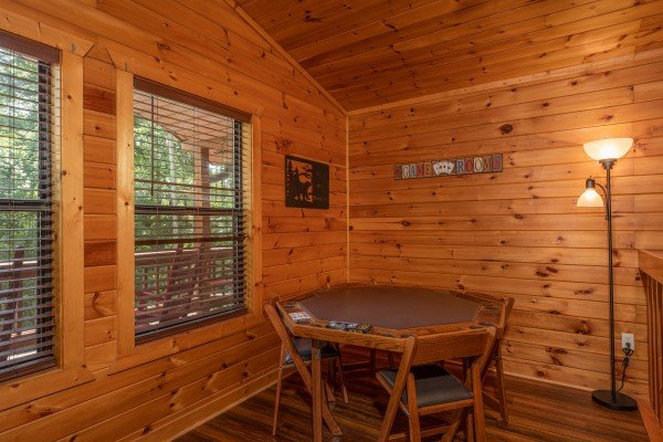 Card table at Hawk’s Heart Lodge, a 3 bedroom cabin rental located in Pigeon Forge