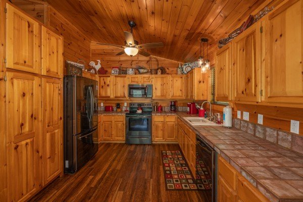Kitchen at Hawk’s Heart Lodge, a 3 bedroom cabin rental located in Pigeon Forge