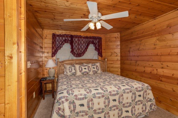King bedroom on the lower floor at Shiloh, a 3 bedroom cabin rental located in Gatlinburg