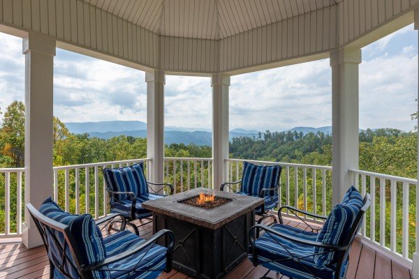 Deck fire pit at Summit Glory, a 5 bedroom cabin rental located in Pigeon Forge