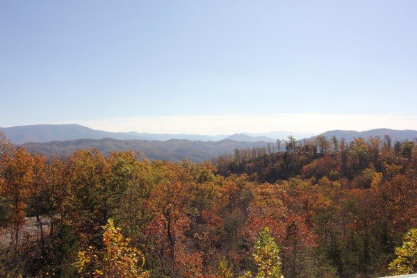 The Smoky Mountains with fall colors at Summit Glory, a 5 bedroom cabin rental located in Pigeon Forge