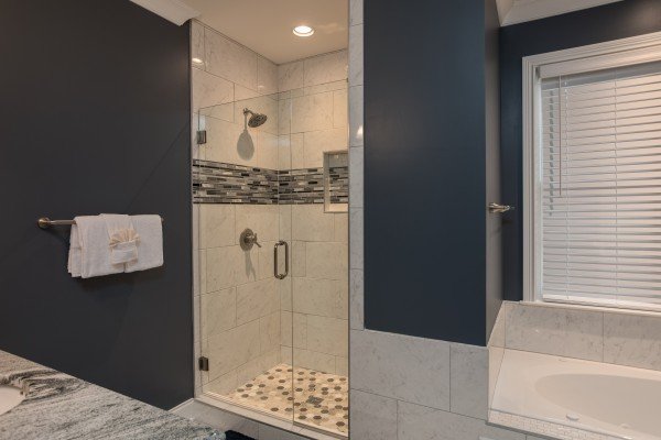Shower in a bathroom at Summit Glory, a 5 bedroom cabin rental located in Pigeon Forge